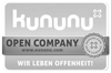 Badge with the inscription 'kununu OPEN COMPANY www.kununu.com WE LIVE OPENNESS!